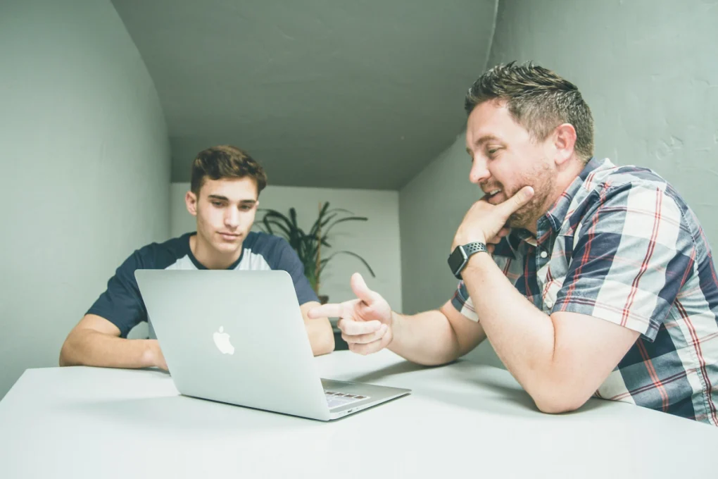 man-talking-to-his-teenage-son-about-the-risks-of-gambling